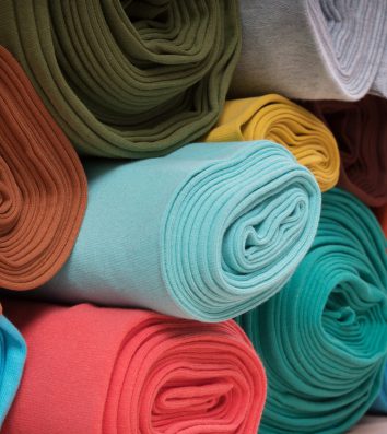 rolls-of-knitted-fabric-in-assortment-P8VAXNT